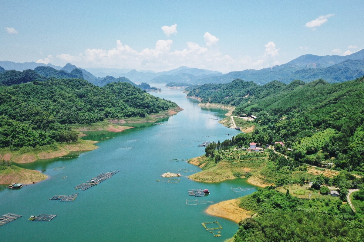 Scenic view of Hoa Binh River in Vietnam Scenic view of Hoa Binh River and mountains in Vietnam