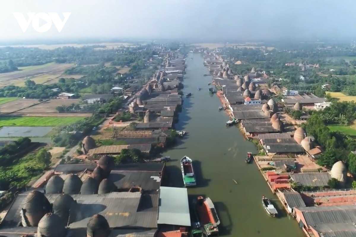 Early morning sunrise over Vinh Long historic site Sunrise casting warm light over the historic buildings and waterways in Vinh Long