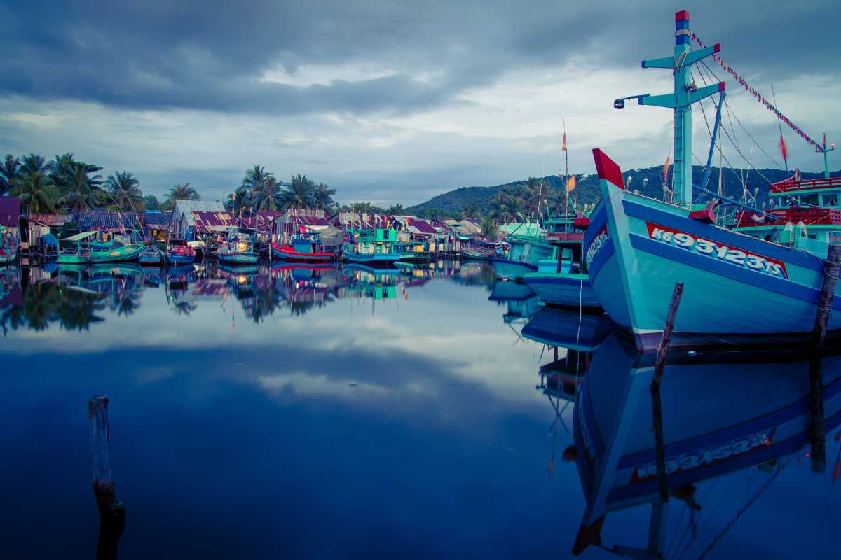 Colorful fishing boats docked at An Thoi harbor in Phu Quoc, the starting point for the 2-day 3-island tour.
