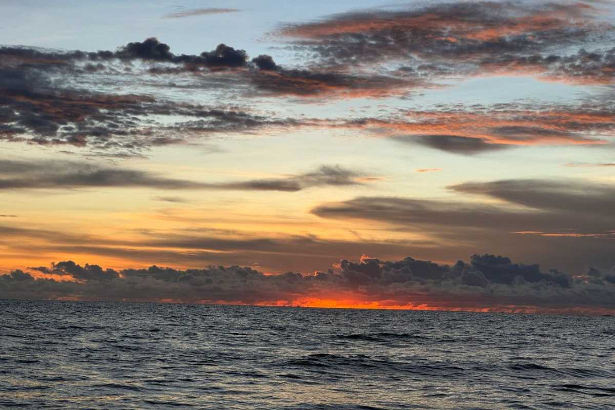 Dramatic sunrise clouds over the open sea in Phu Quoc during a private morning fishing experience